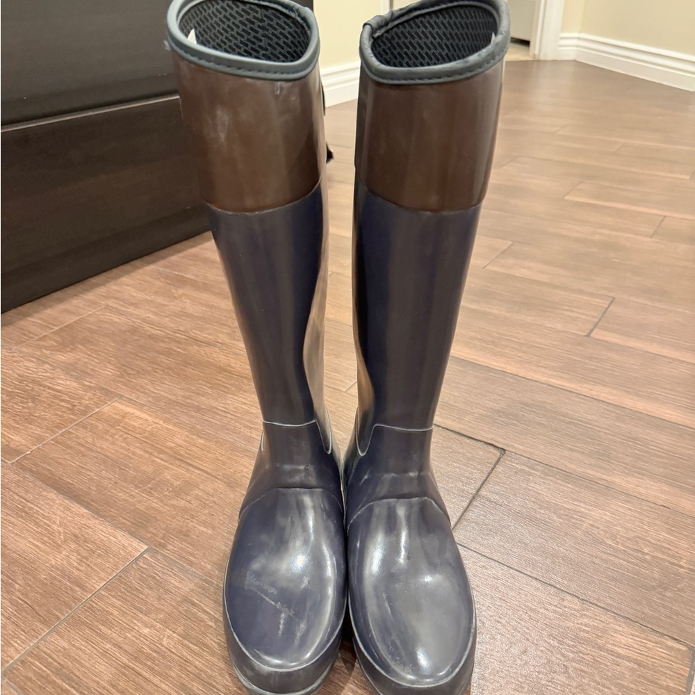 Hunter rain boots.